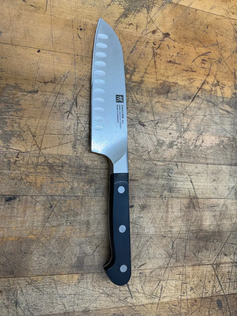 Zwilling Four Star Pro 5.5-Inch Hollow-Edge Santoku Knife 1